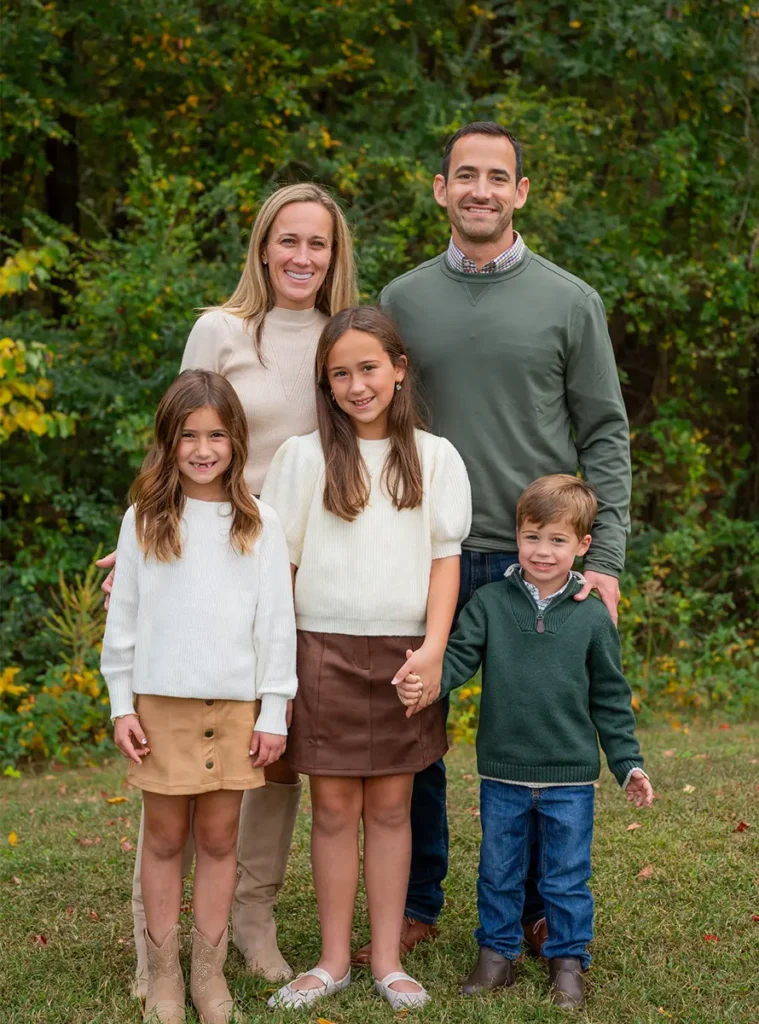 Dr. Andy pictured with his wife, two girls, and a little boy.