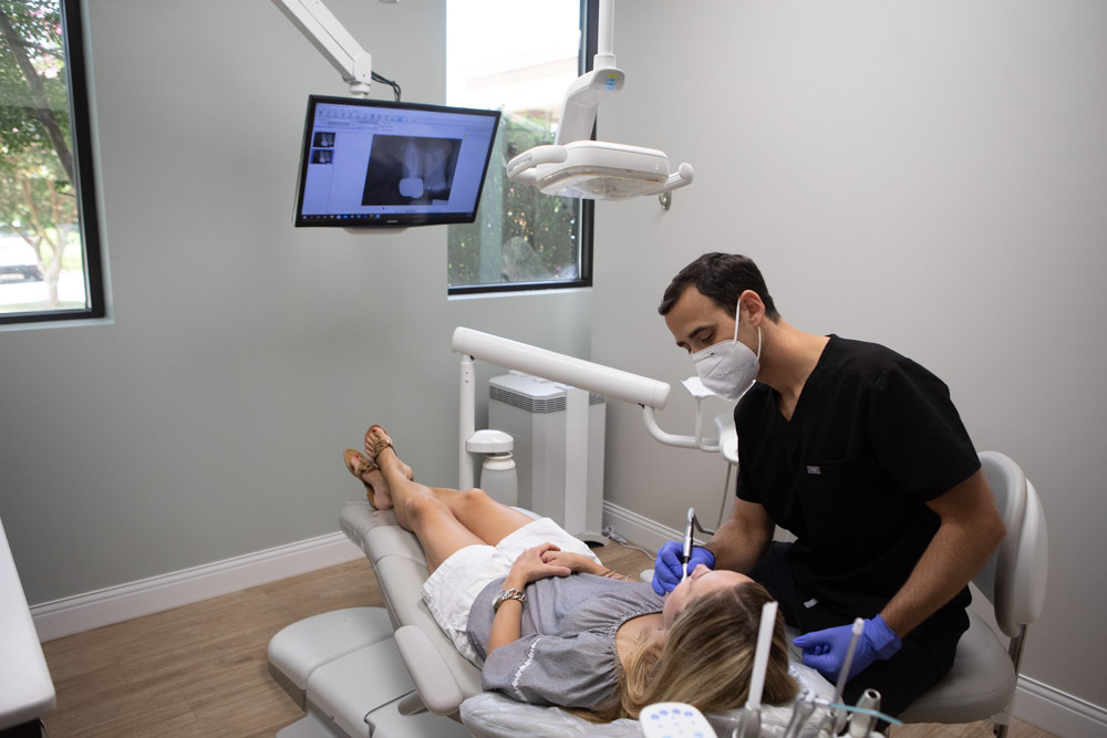 Image of Dr. Andy Pernell performing a dental checkup at Summit Family Dentistry in Denver, North Carolina